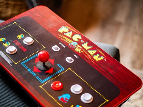 Begin your gaming adventure in our lively game corner. Located in the tv cabinet in the living room