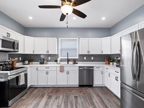 Step into our welcoming kitchen, fully equipped for all your culinary adventures.