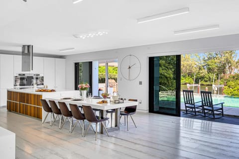 The kitchen offers indoor seating for ten, outdoor breakfast nook, outdoor dinning table for eight.