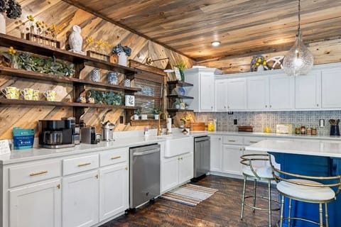 Unleash your inner chef in our dream kitchen, complete with two dishwashers, a warming drawer, and plenty of counter space for effortless meal prep and cleanup