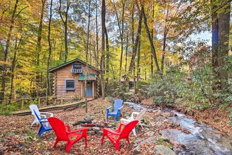 Relax around the fire pit by the creek. Small cabin is also down by the fire pit