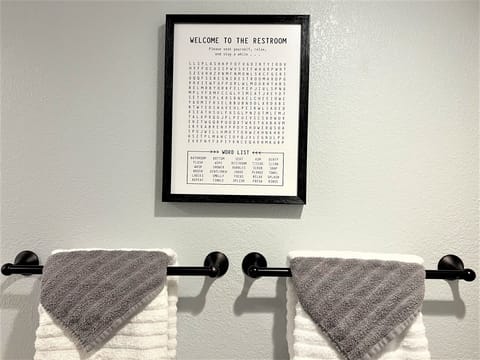 We provide towels for your stay in our stylish bathroom.