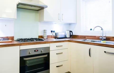 Comfort Apartment | Private kitchen | Full-size fridge, microwave, oven, toaster