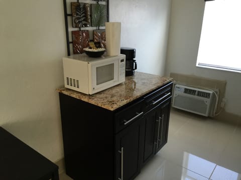 Full-size fridge, microwave, coffee/tea maker, toaster