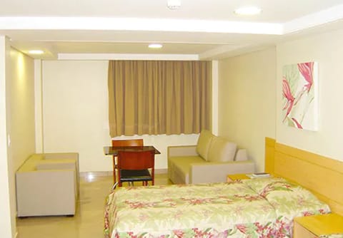 Standard Double Room | Minibar, in-room safe, desk, blackout drapes