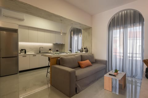 Premium Apartment | Living area | 43-inch Smart TV with cable channels