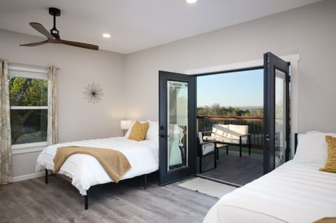 Enjoy waking up to the great hill country views through the private patio exit