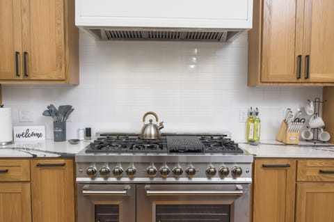 Cook up a storm in our Broken Bow cabin with a commercial-grade double oven!