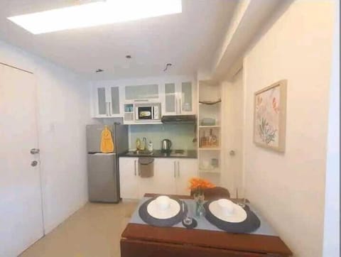 Premier Apartment, City View | Private kitchen | Full-size fridge, microwave, stovetop, cookware/dishes/utensils