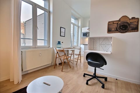 Vue d'ensemble salon + cuisine