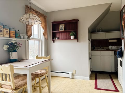 3rd floor kitchenette includes a dishwasher, stove, microwave and refrigerator.