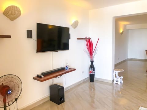 Design Penthouse | Living area | 24-inch Smart TV with digital channels