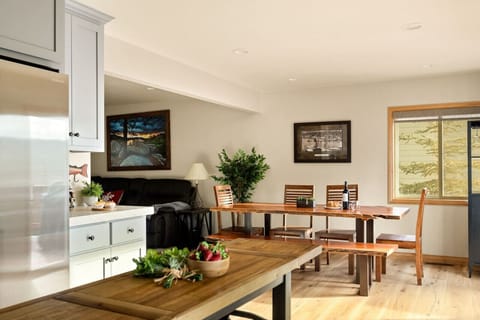 Open concept kitchen and dining room space.