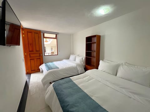 Premium bedding, laptop workspace, iron/ironing board, free WiFi