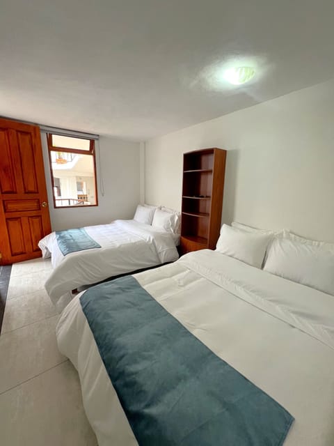 Comfort Quadruple Room, 2 Double Beds | Premium bedding, laptop workspace, iron/ironing board, free WiFi