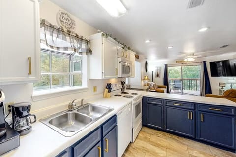 Whip up a delicious meal in our fully stocked kitchen - the heart of our cozy condo that's sure to inspire your inner chef!