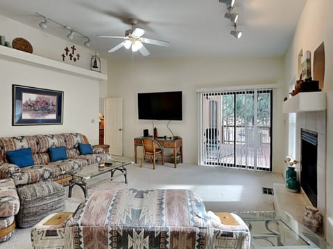 Condo, Multiple Beds, Pool Access | Living area | TV, fireplace