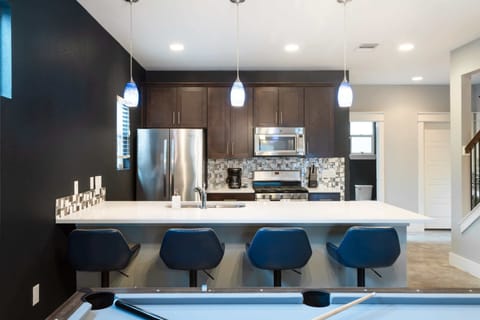 Fully Equipped Kitchen with Bar Seating