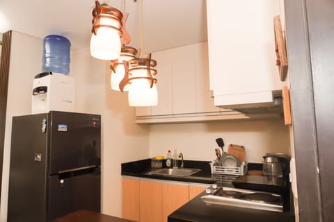 Exclusive Apartment | Private kitchen | Full-size fridge, microwave, stovetop, rice cooker