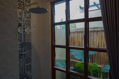 Deluxe Villa, 1 King Bed | Bathroom | Shower, rainfall showerhead, hair dryer, bathrobes
