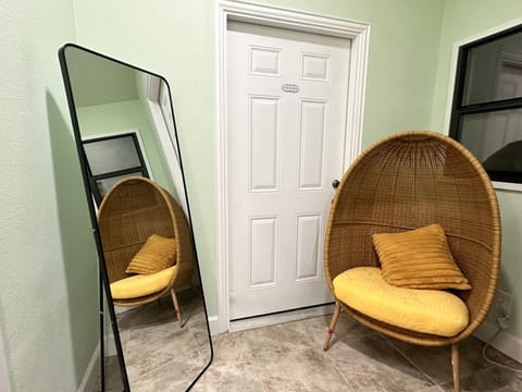 Downstairs bedroom with a bunk double-queen.  Sitting area