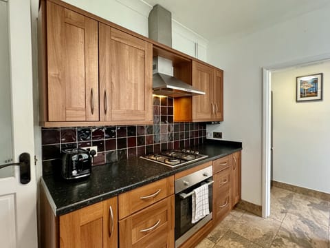 Family House | Private kitchen | Full-size fridge, microwave, oven, stovetop