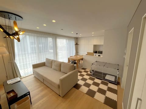 Exclusive Villa, Non Smoking | Living area | Flat-screen TV, heated floors