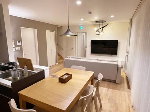Family House, Non Smoking | Living area | Flat-screen TV, heated floors