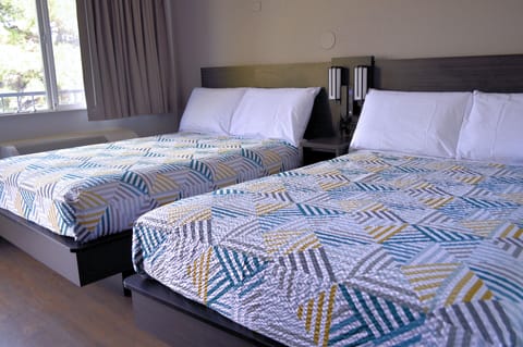 Standard Suite, 2 Queen Beds, Non Smoking | Free WiFi, bed sheets