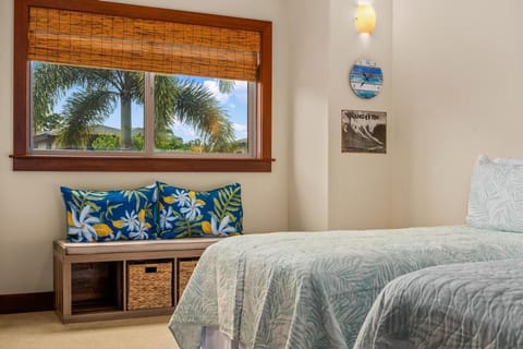 Fresh air and palm views make this bedroom feel like a peaceful tropical retreat.