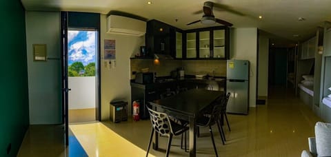 Family Suite | Private kitchen | Fridge, stovetop, coffee/tea maker, electric kettle