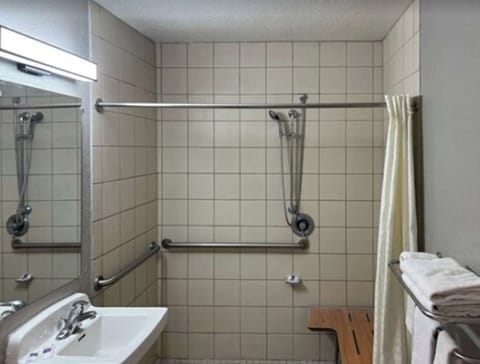 Separate tub and shower, rainfall showerhead, towels, soap