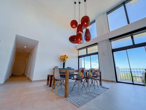 Premium Penthouse | Living area | Flat-screen TV