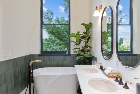 Deluxe Room, Soaking Tub, Mountain View | Bathroom | Designer toiletries, hair dryer, towels, soap