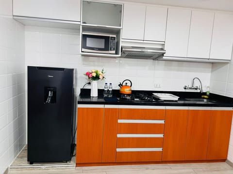 Deluxe Duplex | Private kitchen | Microwave, oven, dishwasher, blender