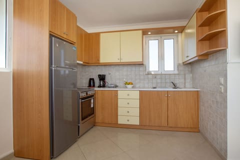 Comfort Apartment | Private kitchen | Full-size fridge, oven, stovetop, toaster