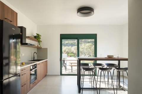 Another fully equipped kitchen for culinary wonders is available.