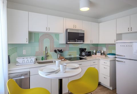 Suite, 1 King Bed, Kitchen | Private kitchen | Coffee/tea maker