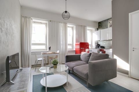 Basic Apartment, City View | Living area | 32-inch flat-screen TV with cable channels