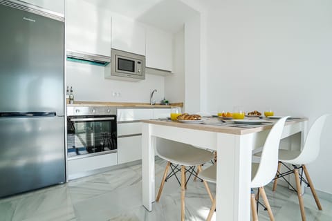 Family Apartment, Non Smoking, Microwave | Private kitchen | Full-size fridge, microwave, oven, electric kettle