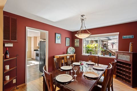 The dining room is next to the kitchen, conveniently.