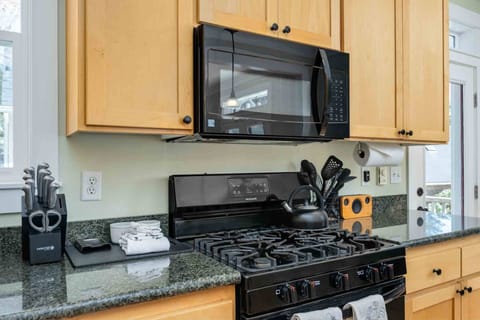 The kitchen is well equipped for a delicious culinary experience. Perfect for cooking dinner, baking cookies, and feeding the whole family!