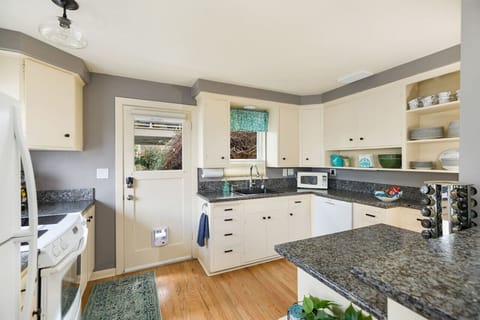 Fully equipped kitchen with all the appliances and utensils you need at your fingertips.