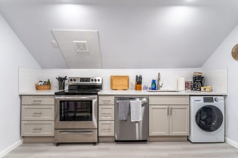 Enjoy a convenient stay with oven, dishwasher, and in-house washing facilities for effortless comfort.