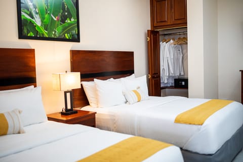 Deluxe Suite, 2 Queen Beds | In-room safe, individually decorated, blackout drapes, rollaway beds