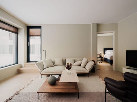 Premium Apartment | Living area | Flat-screen TV