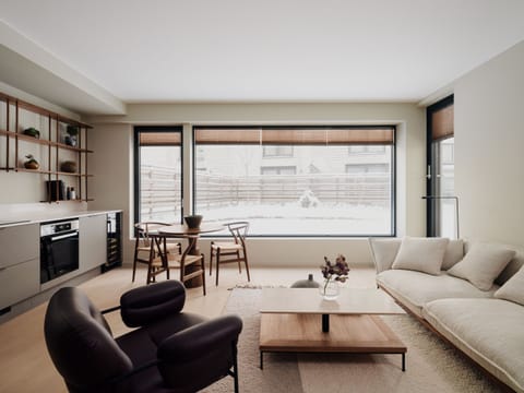 Premium Apartment | Living area | Flat-screen TV