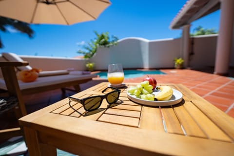 Outdoor pool, pool umbrellas, sun loungers