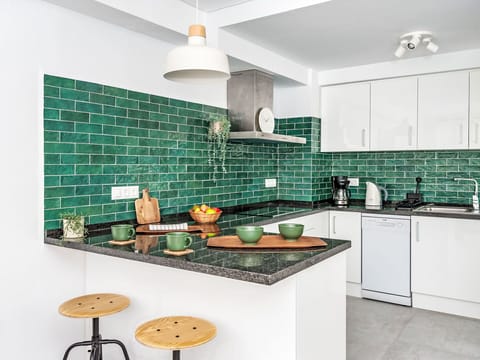 Property, Cabinetry, Countertop, Interior Design, Lighting, Kitchen Stove, Kitchen, Exhaust Hood, Wood, Tap