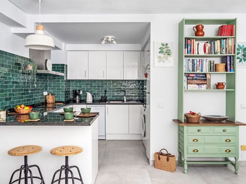 Cabinetry, Furniture, Countertop, Green, Shelf, Table, Interior Design, Drawer, Wood, Shelving